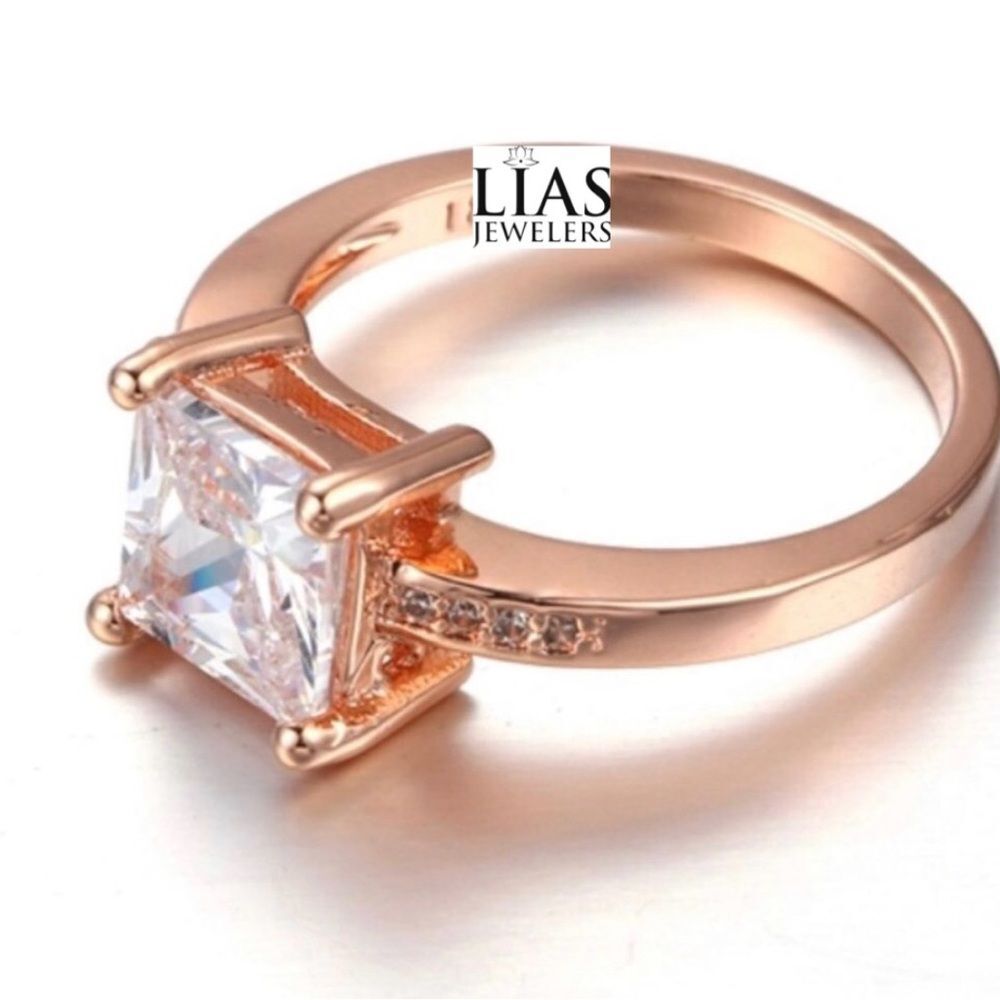 New 18k rose gold engagement ring